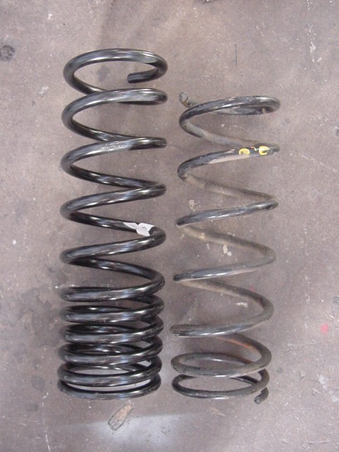 OME coil on left, stock Isuzu on right